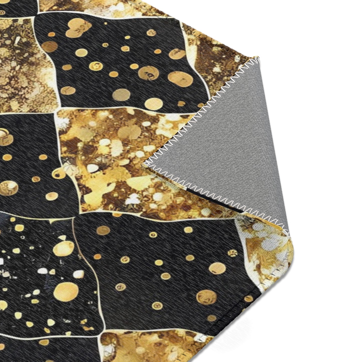 Elegant Area Rug with Gold and Black Pattern