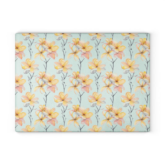Floral Magnolia Glass Cutting Board — Pastel Yellow Blossom Kitchen Decor
