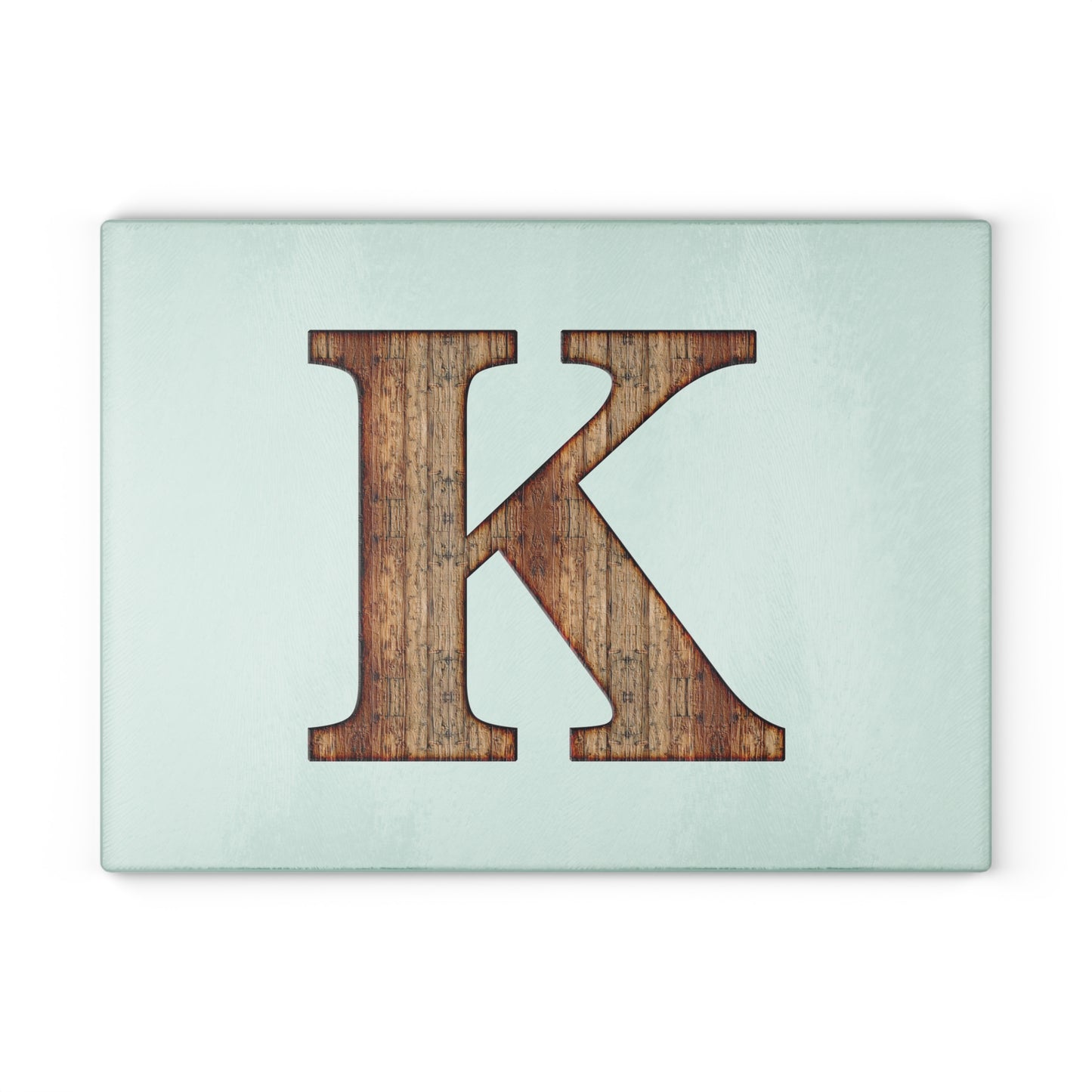 Monogram 'K' Glass Cutting Board — Rustic Wood Letter on Mint Background