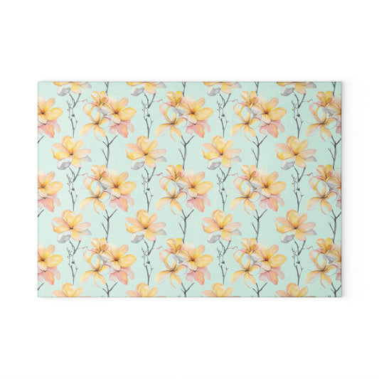 Floral Magnolia Glass Cutting Board — Pastel Yellow Blossom Kitchen Decor