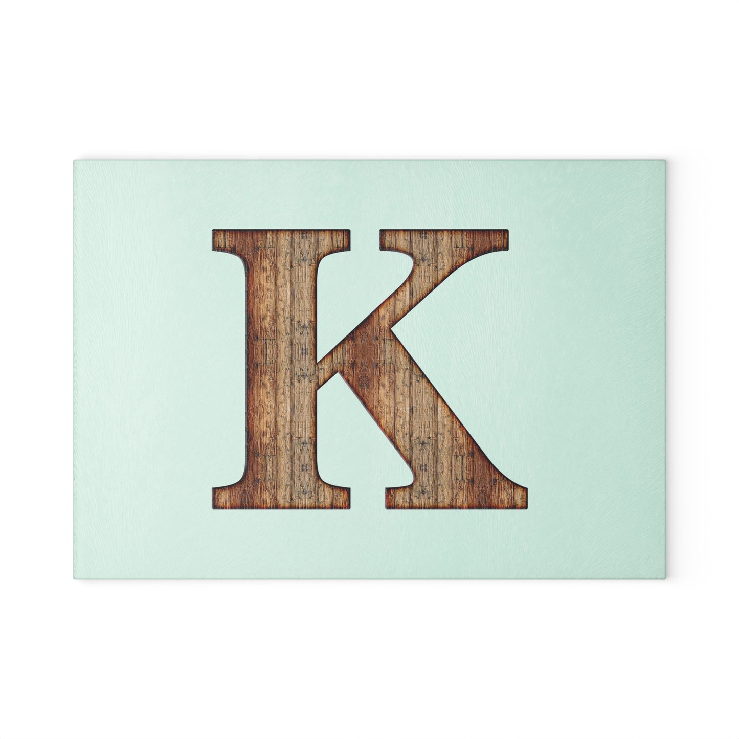 Monogram 'K' Glass Cutting Board — Rustic Wood Letter on Mint Background