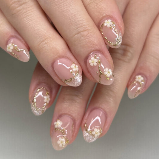 Soft Pink Floral Almond Nails with Gold Details